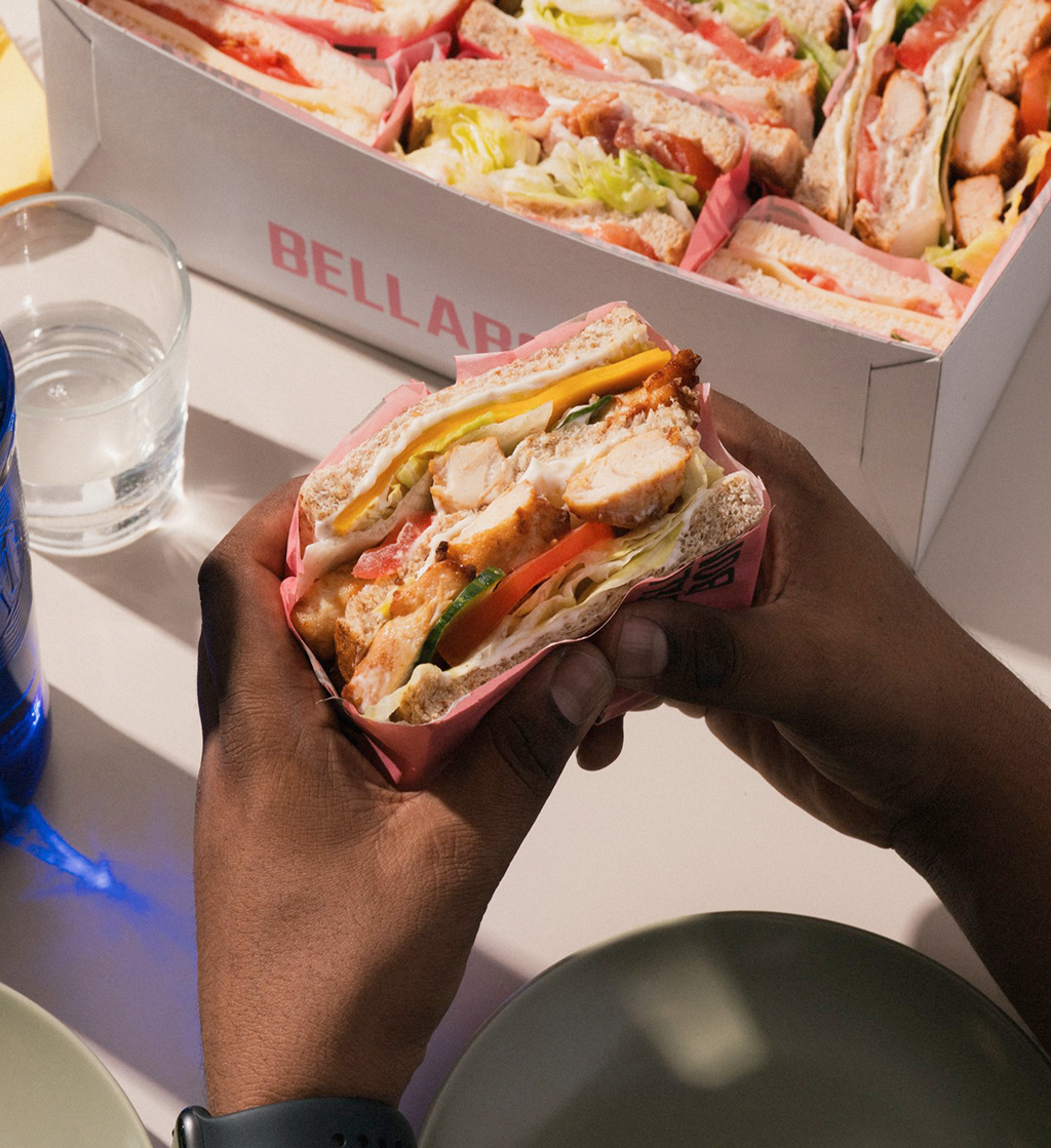 A brunch spread of sandwiches and sides