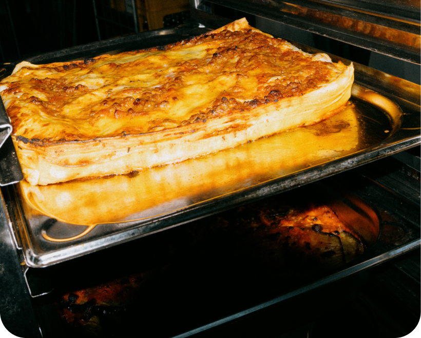 Lasagna baking in the oven