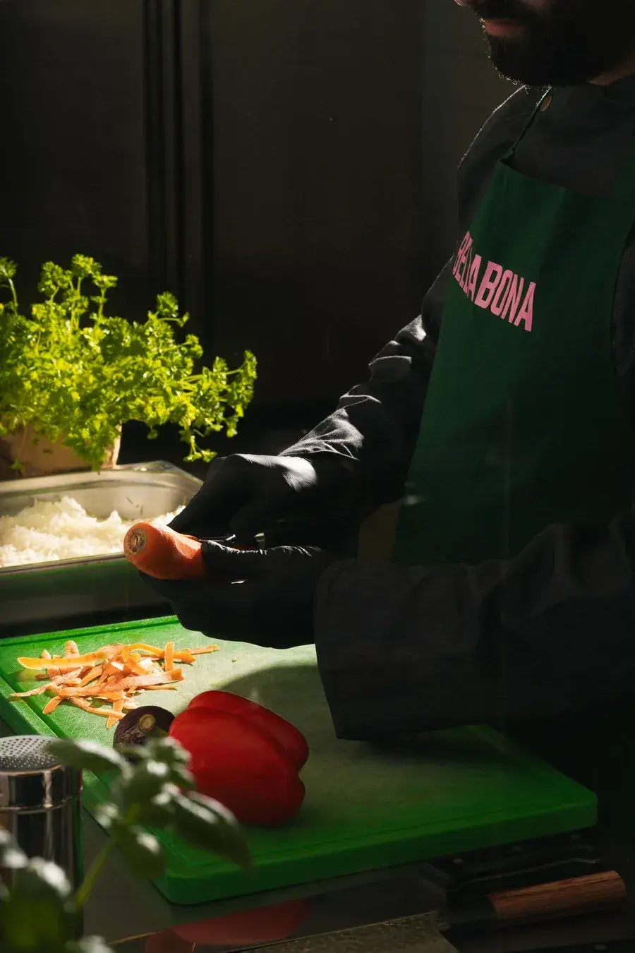 A chef plating fresh food on site