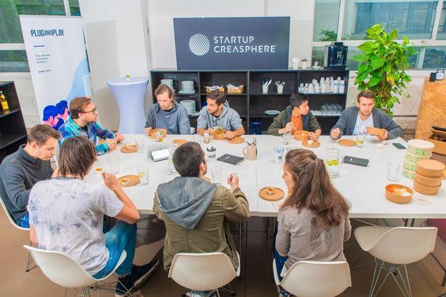 Employees make lunch in a startup building in Berlin.