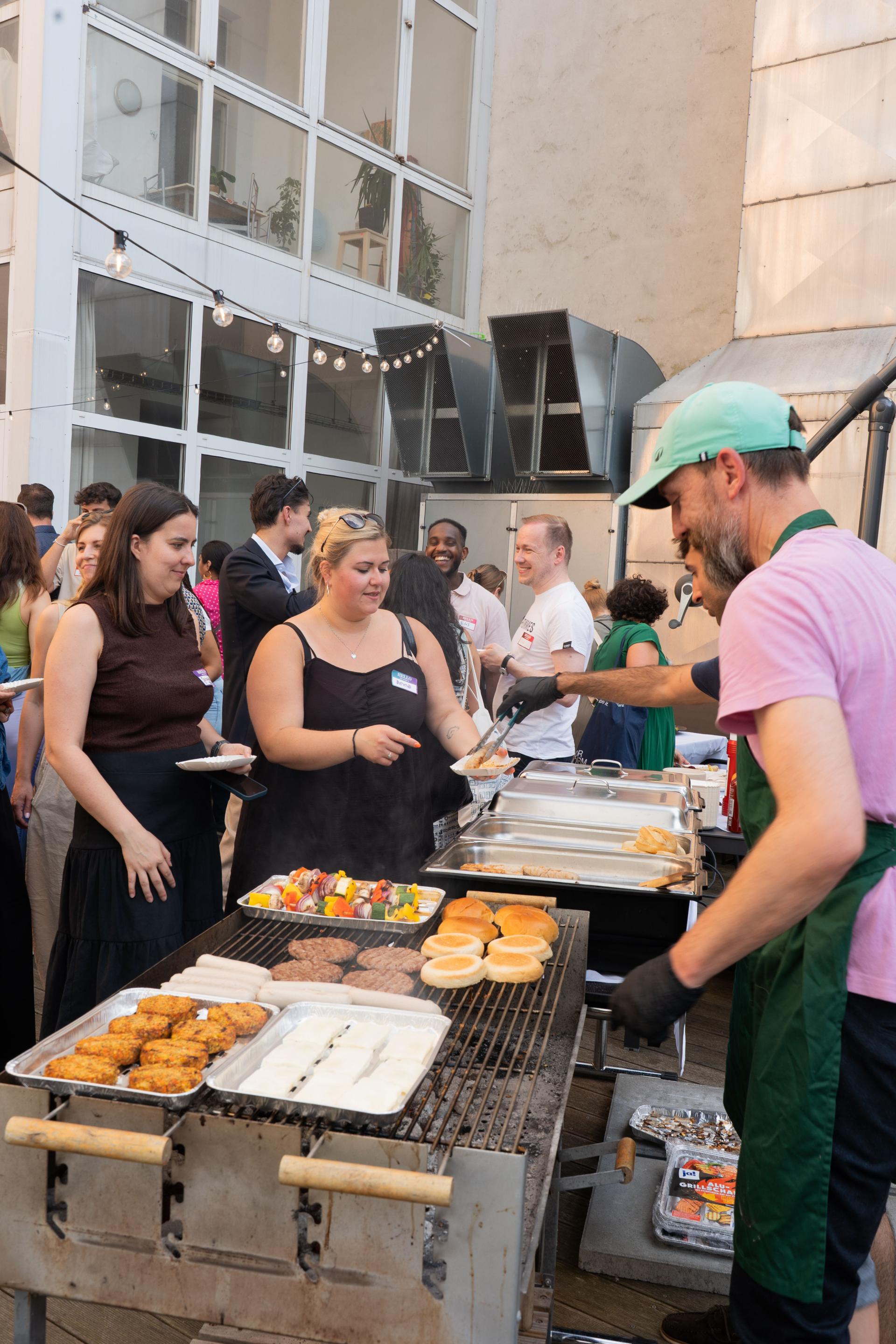 Bella&Bona team grilling on the rooftop at Beyond Benefits